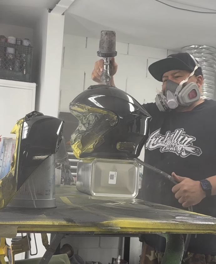 Airballin paints a motorcycle helmet