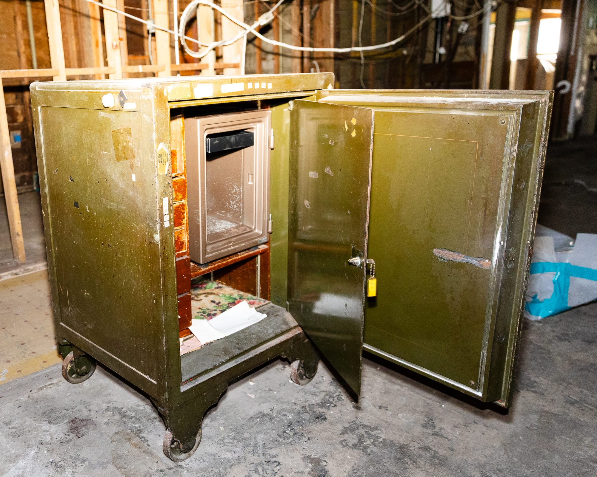 A dusty safe, its doors wide open