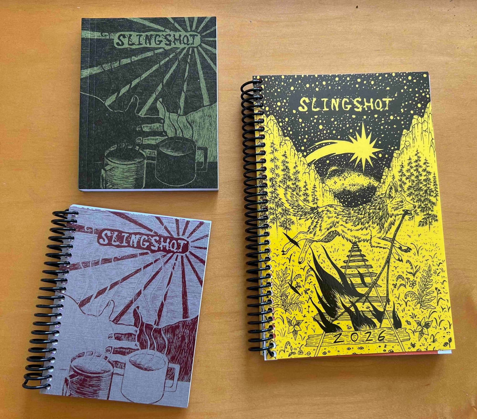 three different colors/sizes of Slingshot organizers