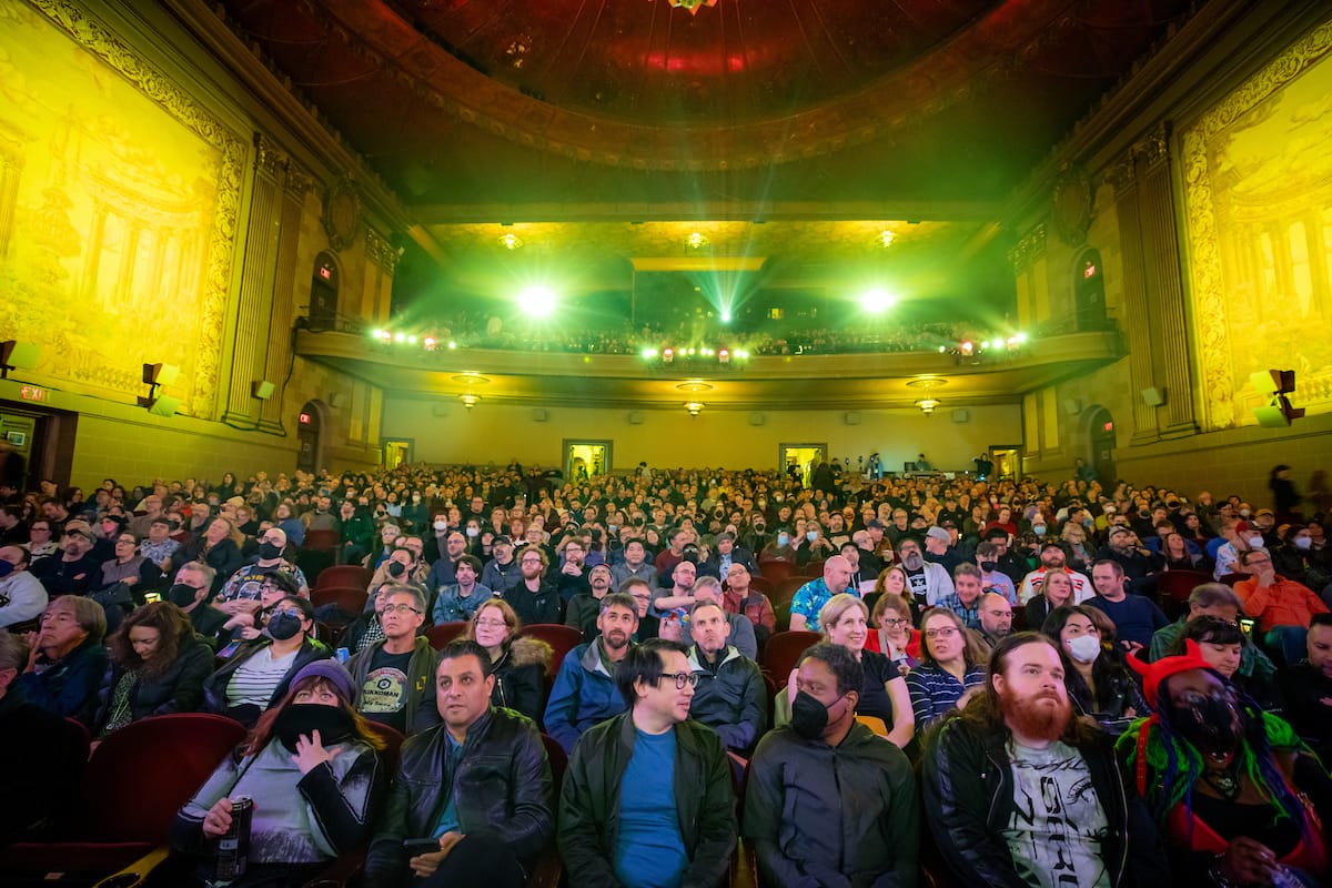 a shot of a crowd in a theater