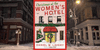 Cover of a book, "Christmas at the Women's Hotel" by Daniel M. Lavery, with an illustration of a pink hotel facade with Christmas decor and a tree out front. Background: a snowy city street.